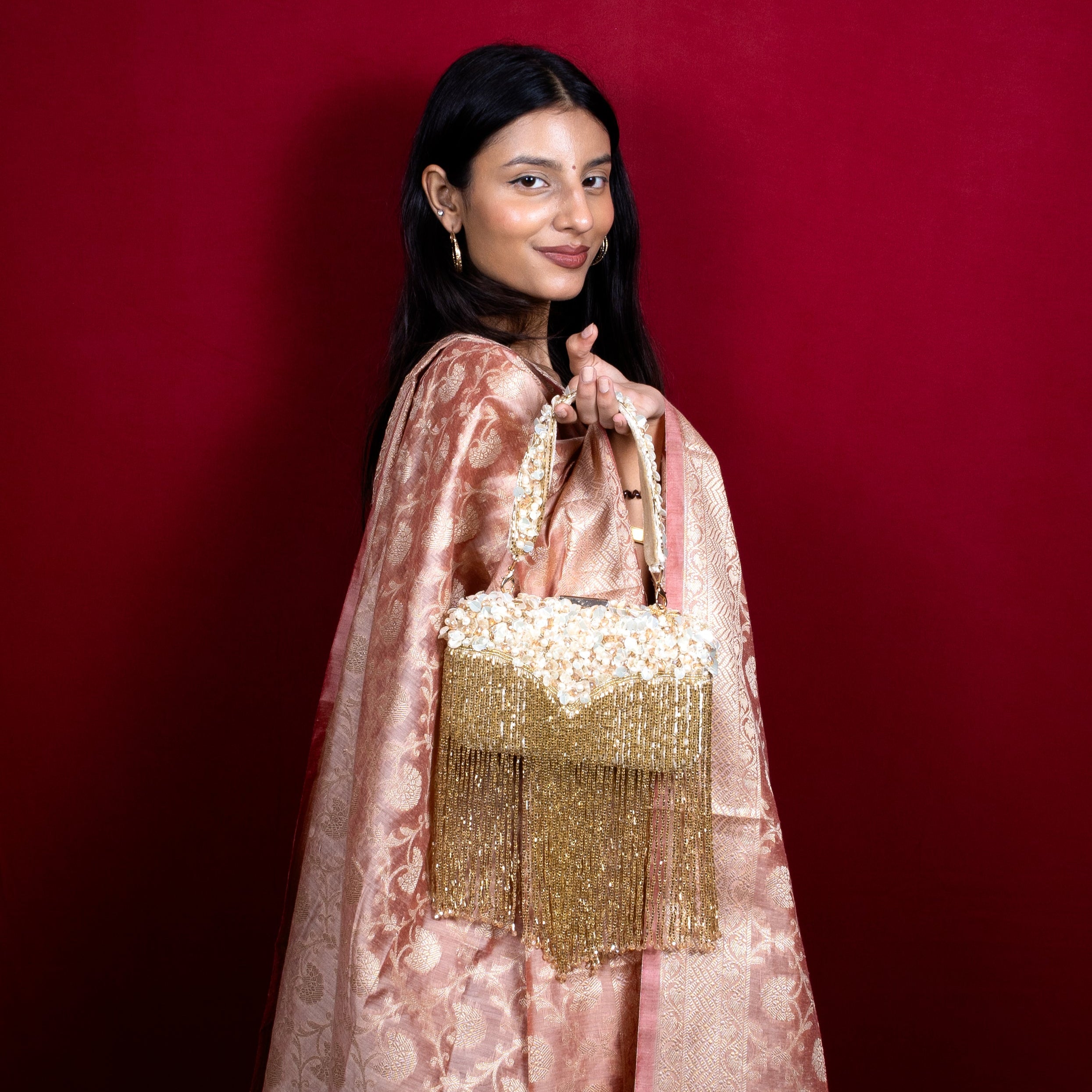 Magnolia-Luxe Gold Clutch with Embellished Fringe Detail