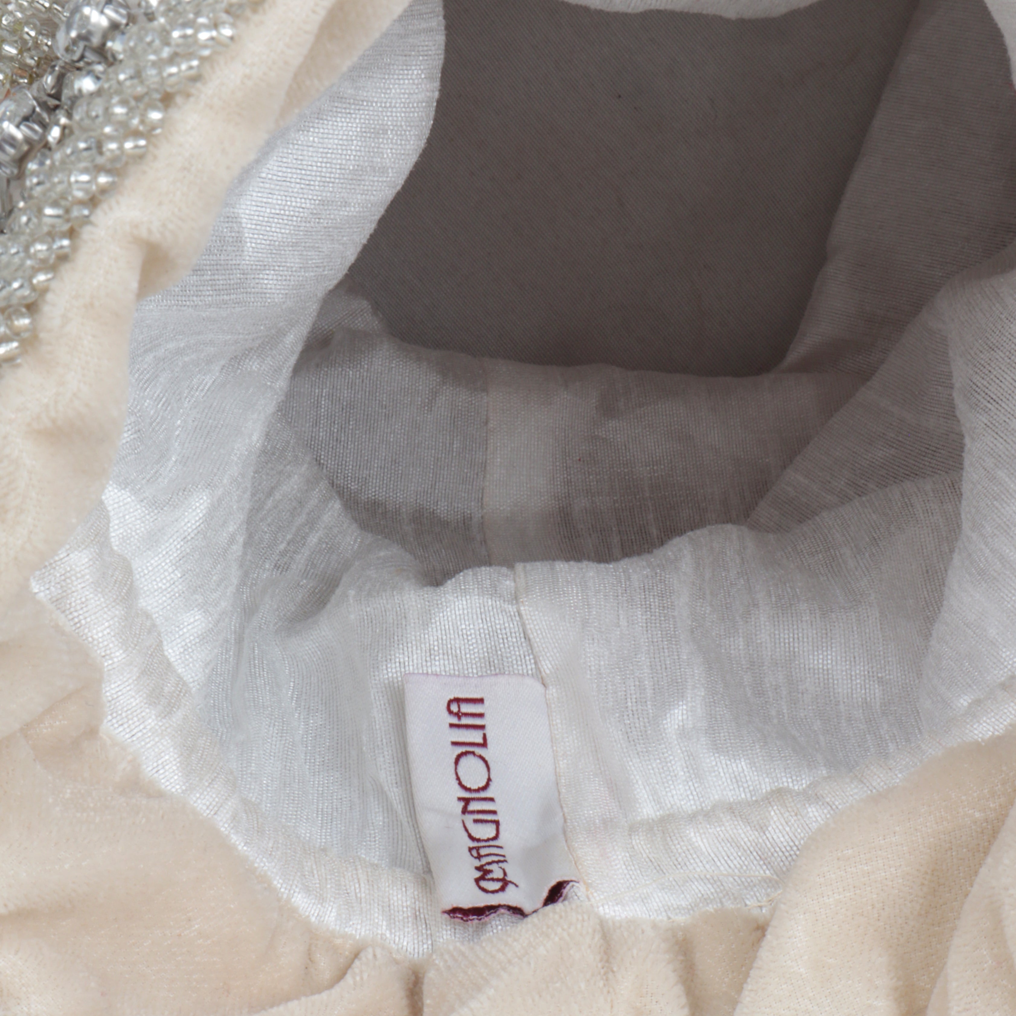 Magnolia Velvet Embroidered Potli Bag – Peach Gold with Silver Embroidery