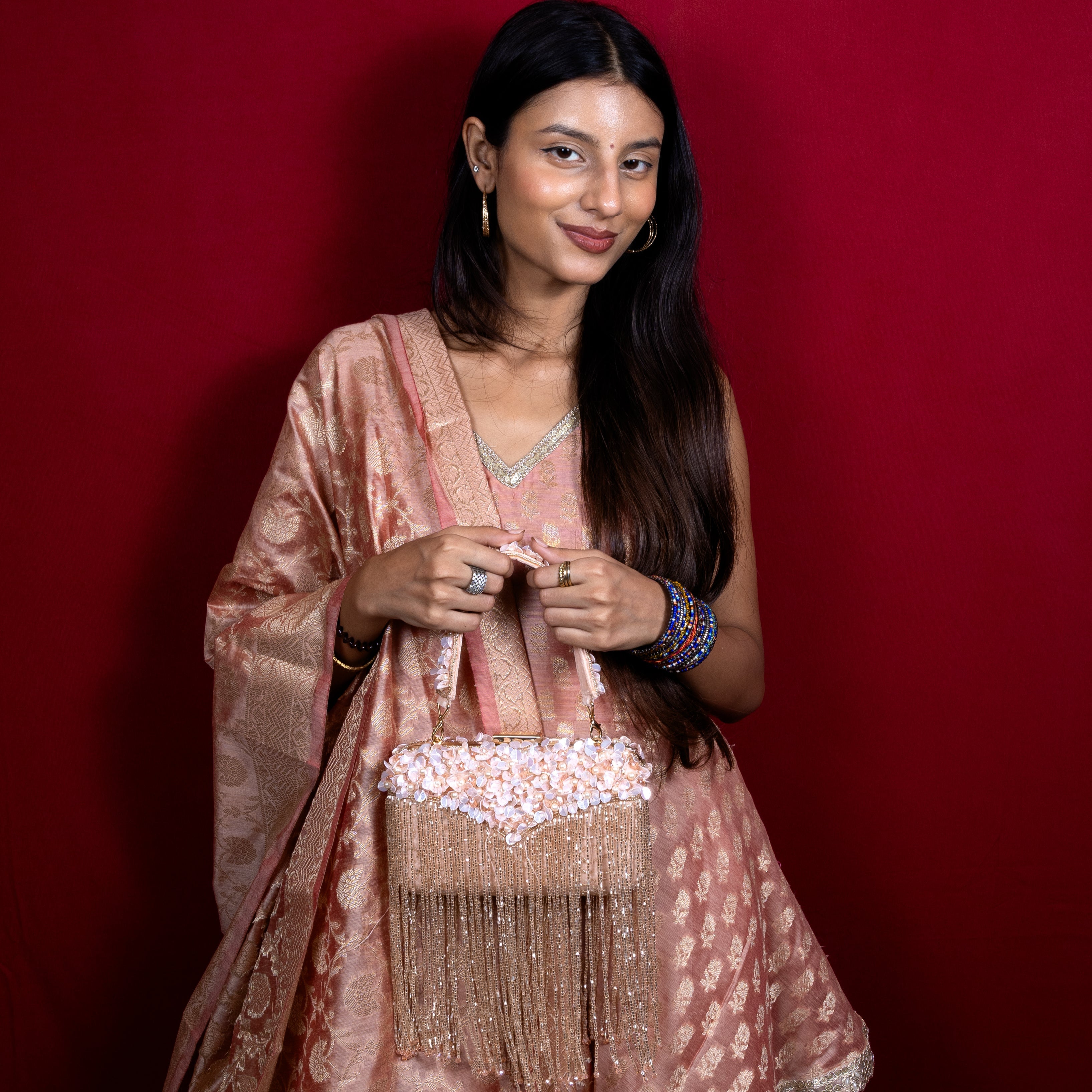 Magnolia-Luxe Peach Clutch with Embellished Fringe Detail