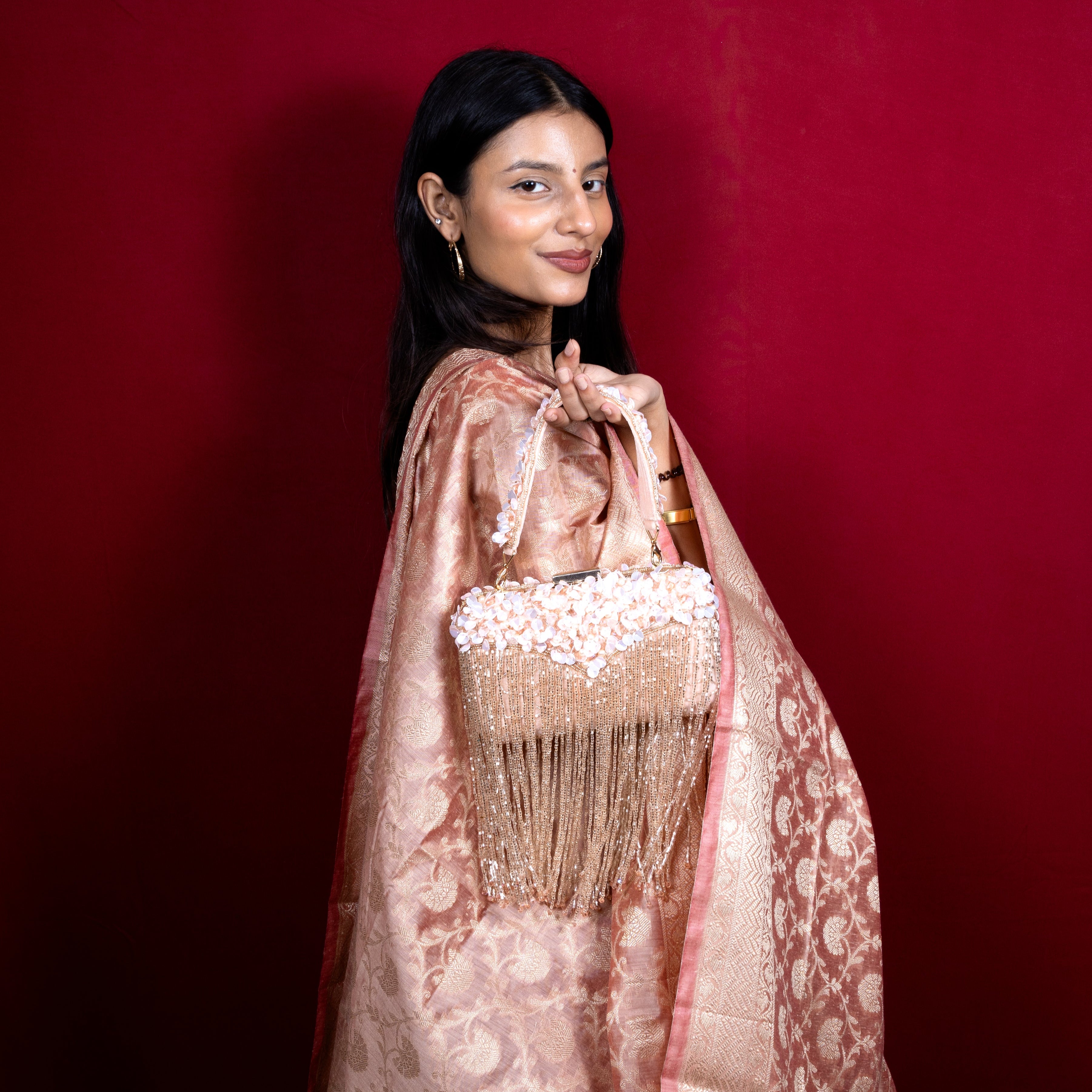 Magnolia-Luxe Peach Clutch with Embellished Fringe Detail